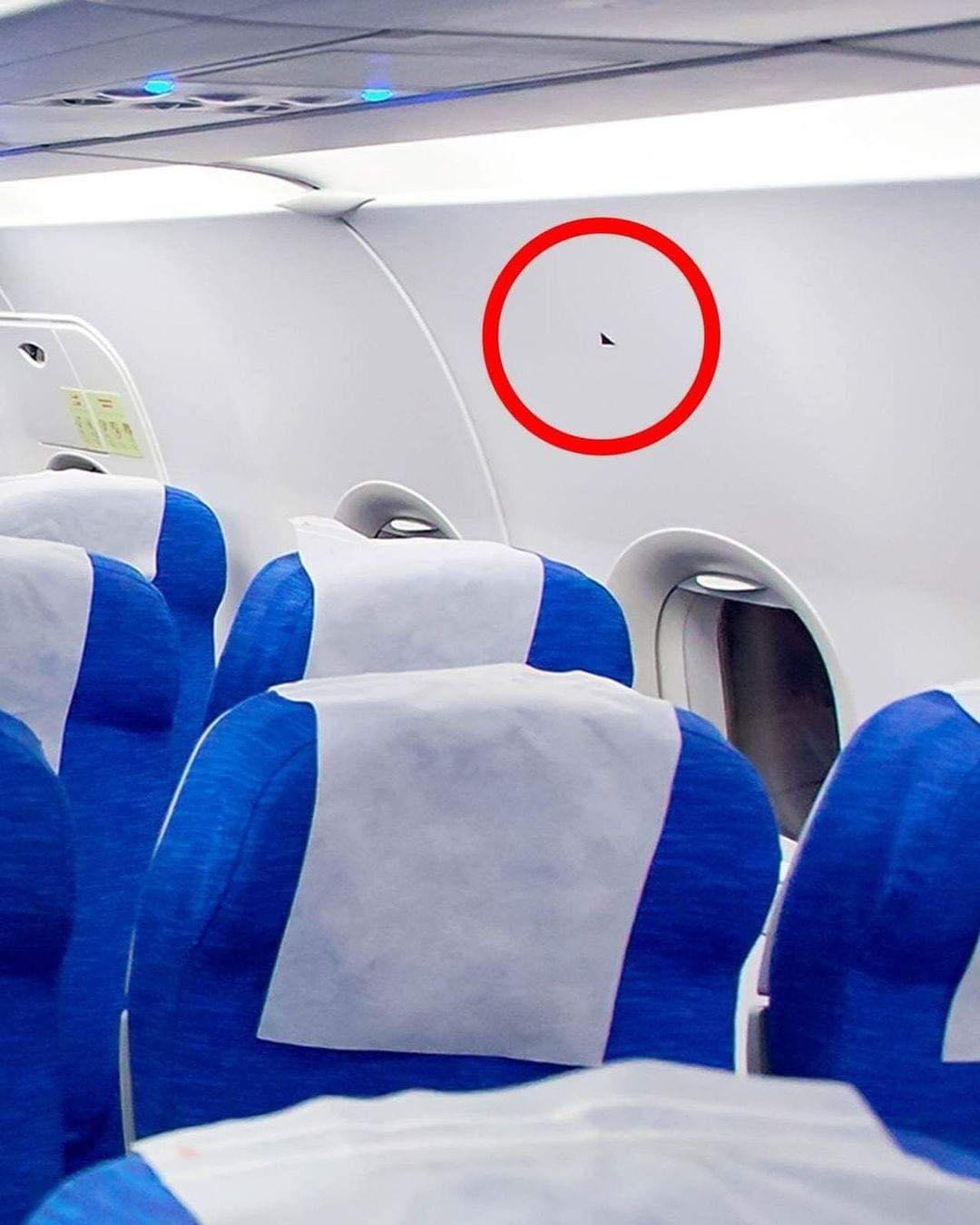 Here’s what the the triangle stickers above your airplane seat mean