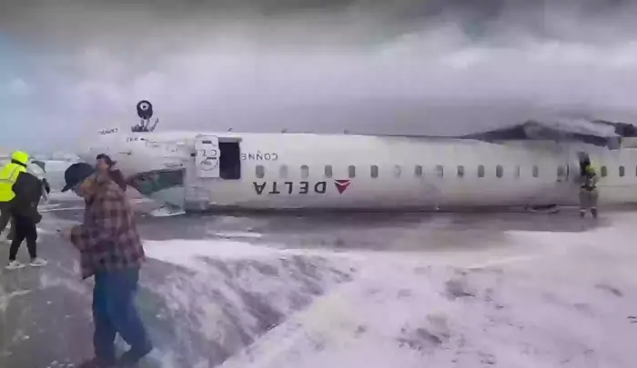 Startling footage captures a Delta Airlines flight that was flipped upside-down following a crash landing in Toronto.